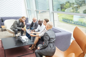 Diverse Group of Business People Discussing Project